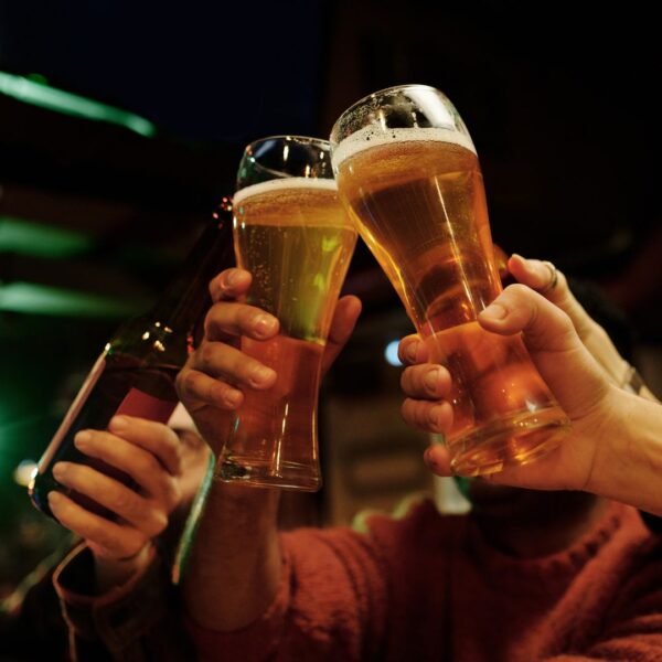 clinking beers together